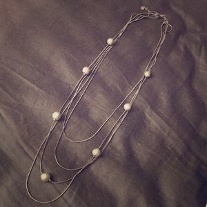 Long fashion statement silver necklace